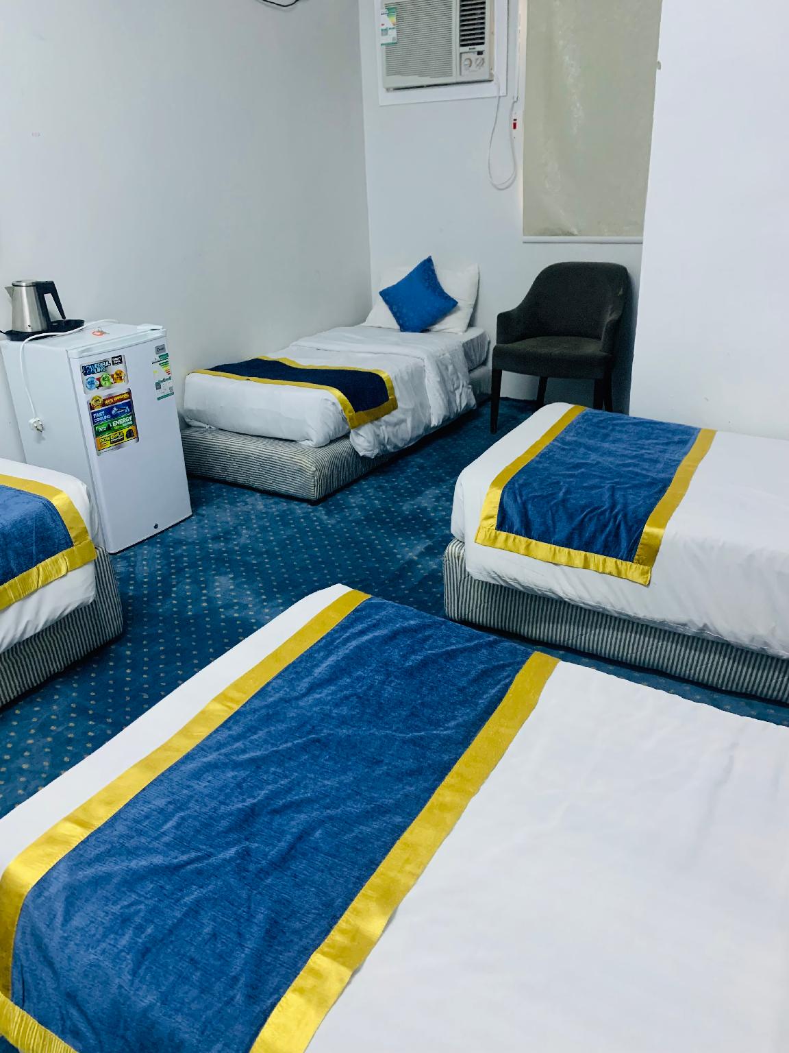 Deluxe Quadruple Room image 4