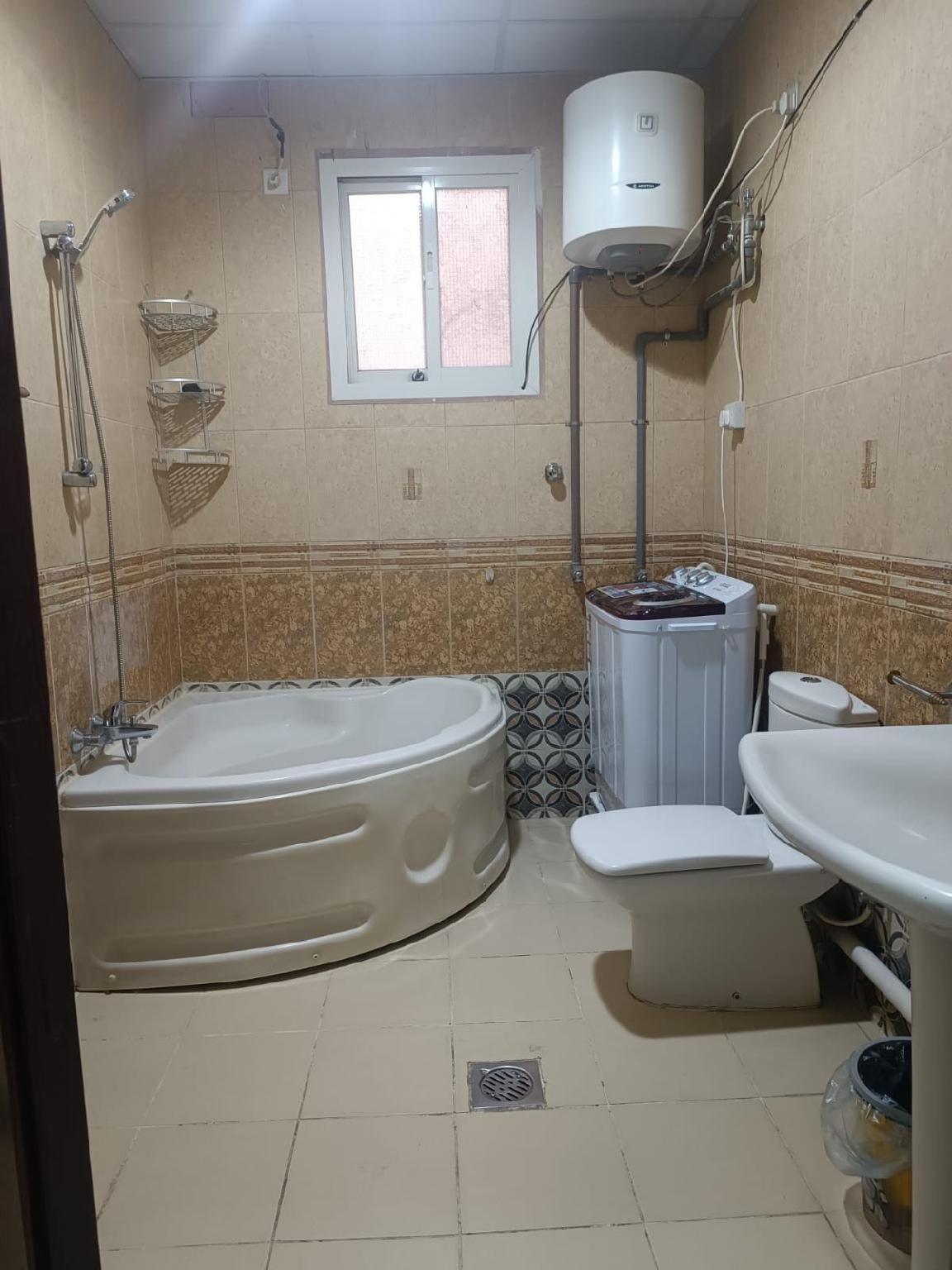 Modern 2-Bedroom Apartment with a Living Room  - afbeelding 9