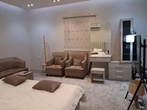 Raqi Master Studio Bed and Bathroom in Al Shorouq District s3 - image 1