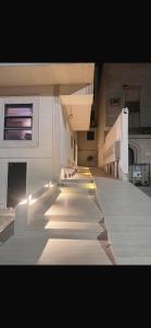 A suite with a room and a lounge with a quiet and modern design - image 11
