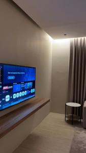 A suite with a room and a lounge with a quiet and modern design - image 10