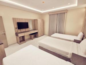 Barakah Al Madinah Al Dhahabi Hotel - imagen 9