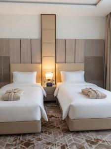 Al Sumuw Al Mutaqaddim Hotel - image 4