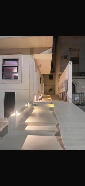 A suite with a room and a lounge with a quiet and modern design - image 11