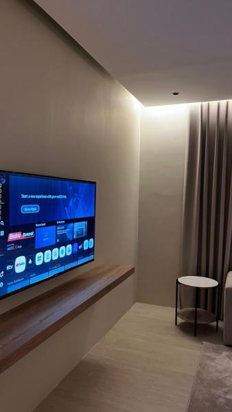 A suite with a room and a lounge with a quiet and modern design - image 10