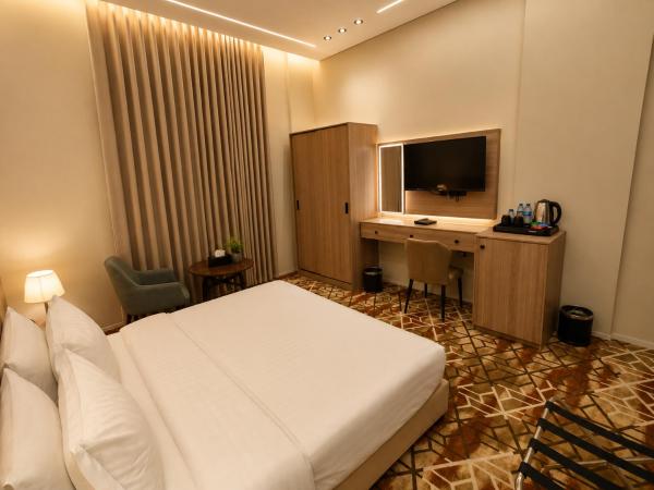 Tomouh Al Mutahidah Hotel - afbeelding 31