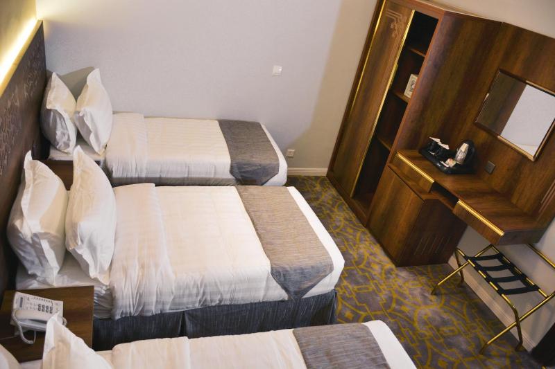 Deluxe driepersoonskamer afbeelding 4