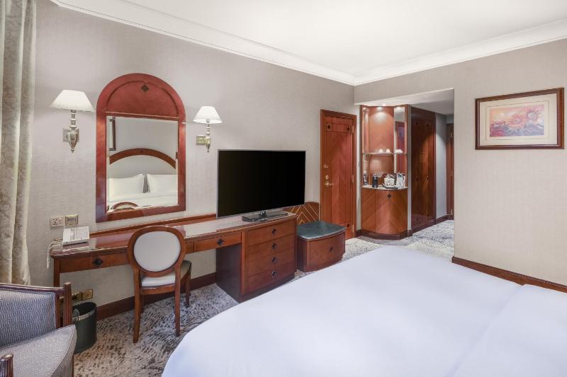 Habitación deluxe con cama King y vistas a la ciudad