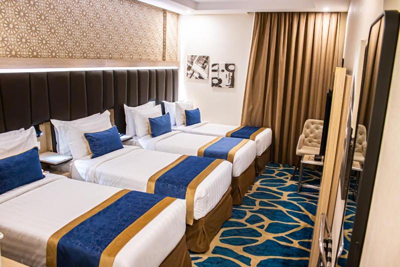 Kamar Quadruple dengan Kamar Mandi Pribadi