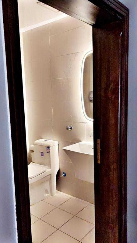 Economy Triple Room image 3