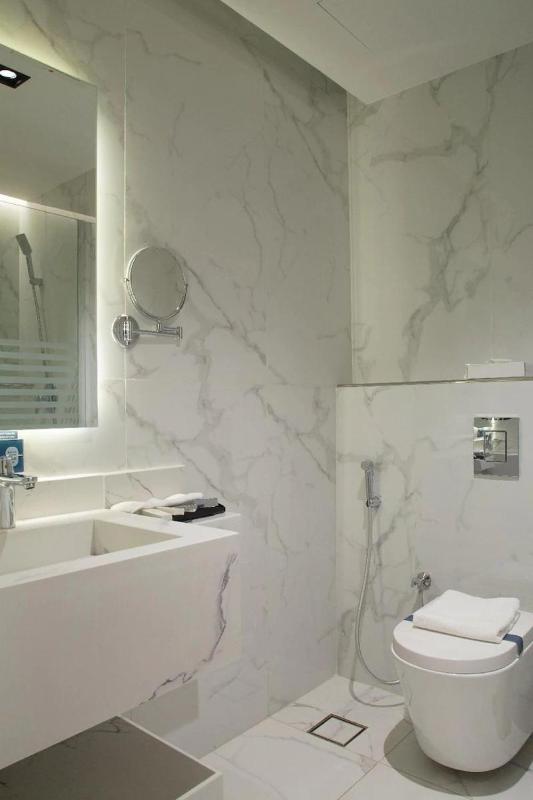 Deluxe kamer met kingsize bed afbeelding 4
