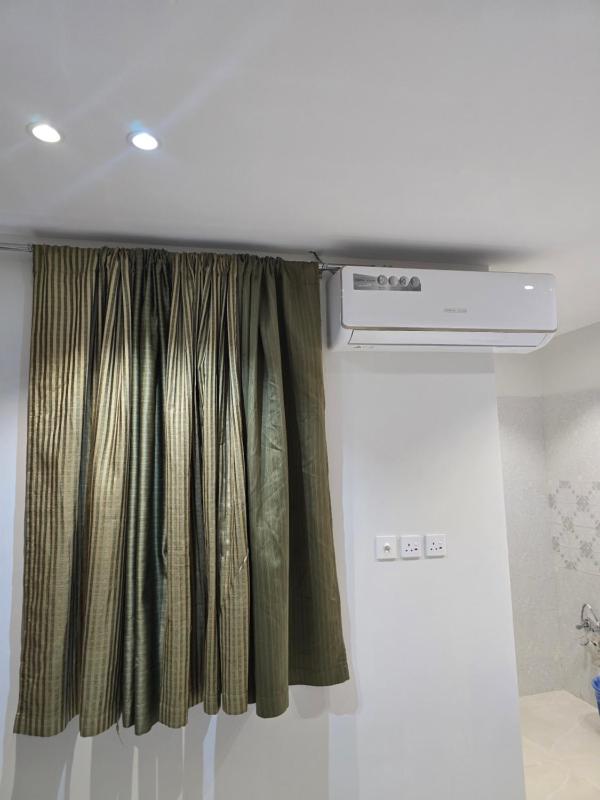 Quadruple Room with Private Bathroom image 2